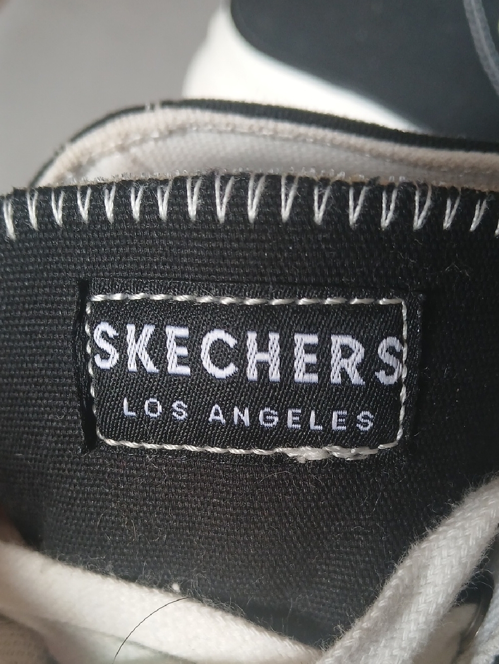 Skechers Black and White High-Top Platform Sneakers - Picture 2 of 7